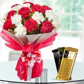 A Bunch of 10 red and White Carnations with 3 Cadbury Temptation Chocolates